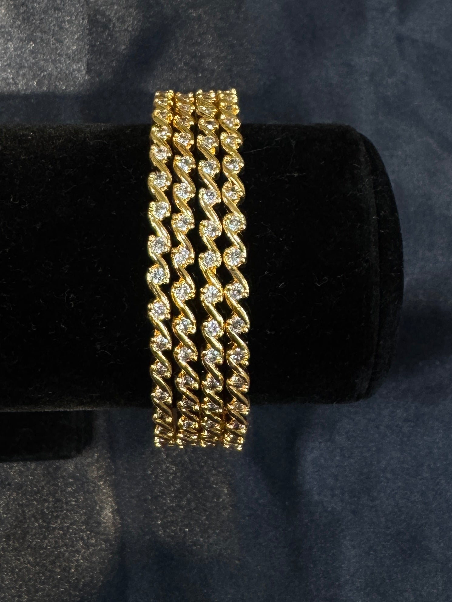 Appealing White Stones Modern Design Gold Plated Bangles For Women.