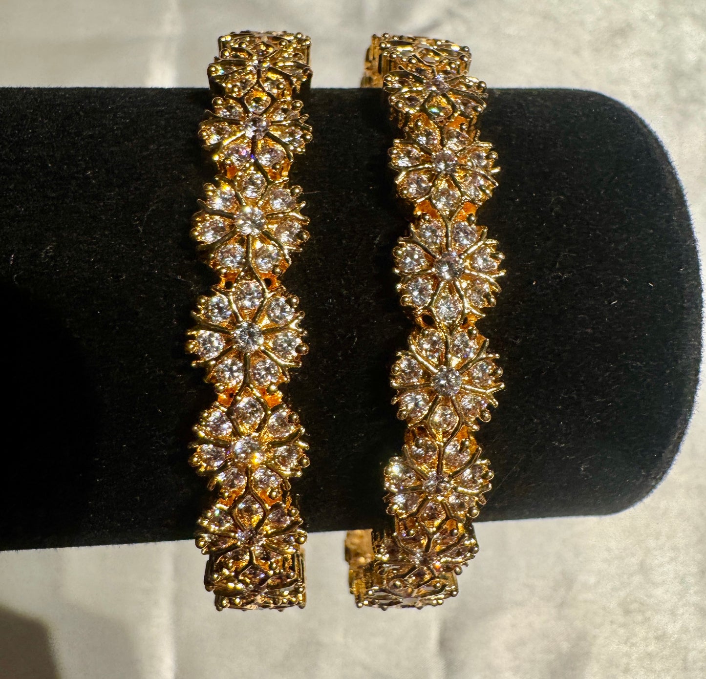 Elegant Gold Plated With Flower Design White Stones Embedded Bangles