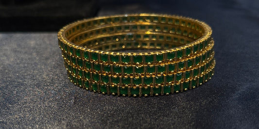 Elegant Green Stones Modern Design Gold Plated Bangles.
