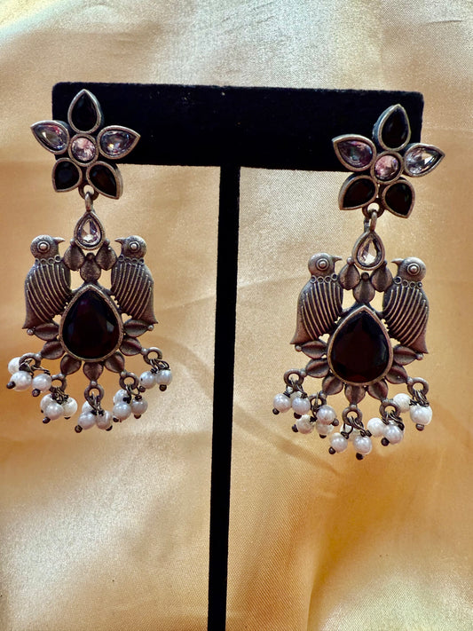 Appealing Oxidized Black And Silver Stone And Beaded Work Bird Designs Earrings For Women