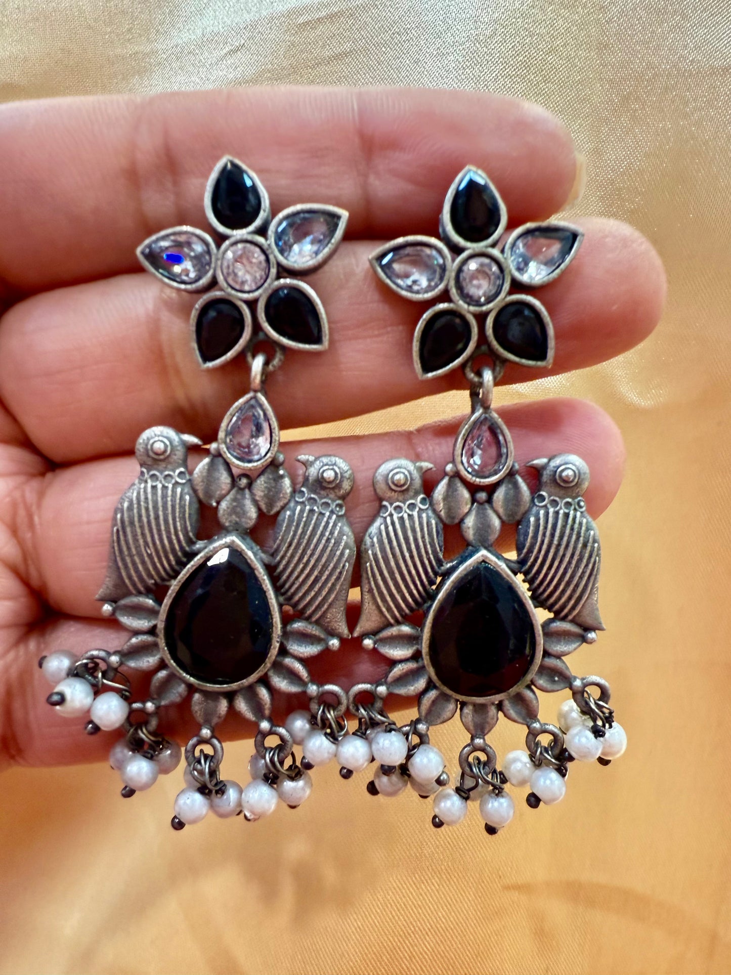 Appealing Oxidized Black And Silver Stone And Beaded Work Bird Designs Earrings For Women