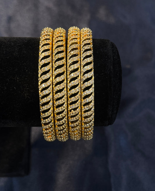 Pleasing White Stones Gold Plated Wave Design Bangles For Women