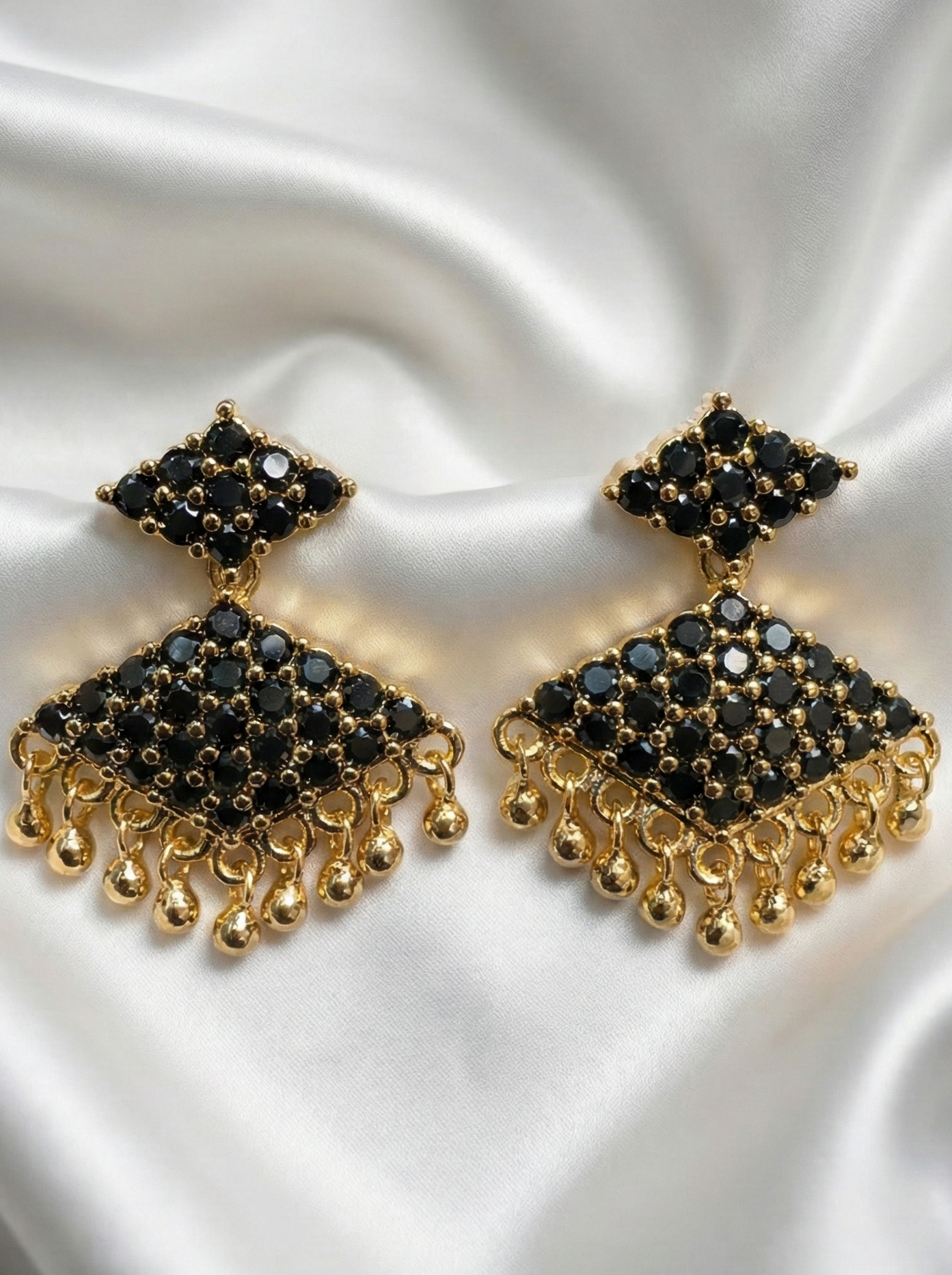 Adorable Black Stones Gold Plated Earrings in Chandler