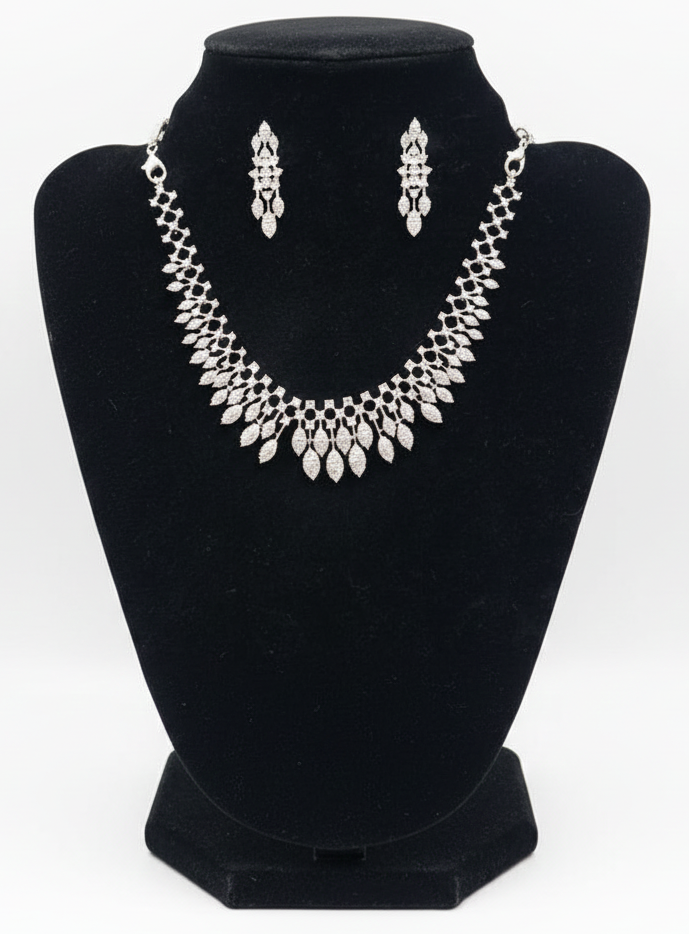 Pleasing Leaf Design American Diamond White Color Stones Necklace and Earrings Set