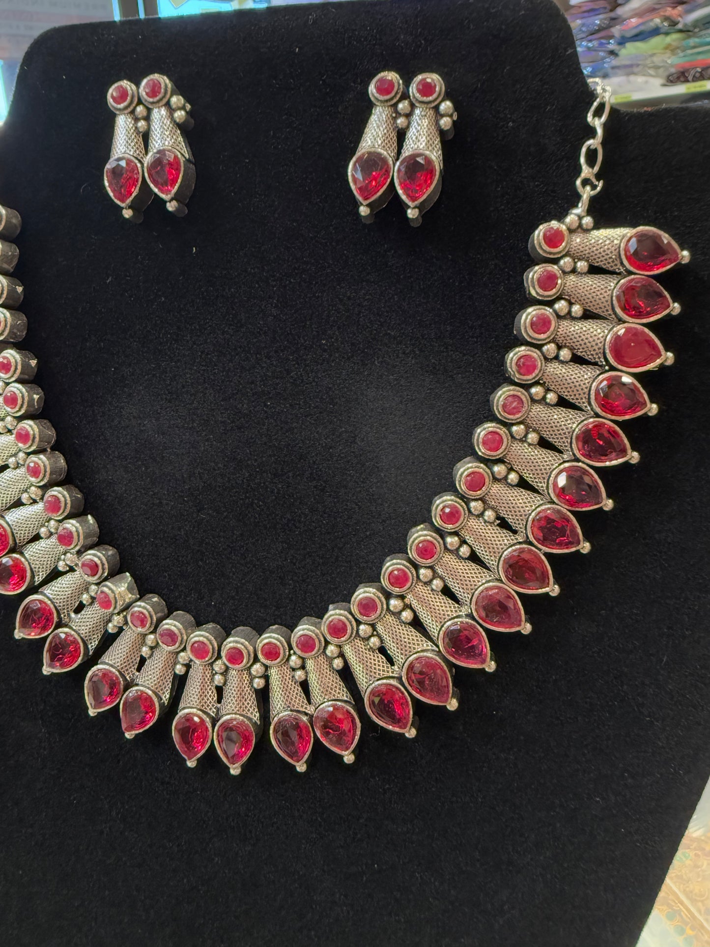 Alluring Magenta  Color Studded Design Silver Toned Oxidized Necklace Set With Earrings