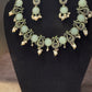 Amazing Sky Blue Stone Studded Peacock Design Silver Plated Oxidized Necklace Set With Earrings And Pearl Beads