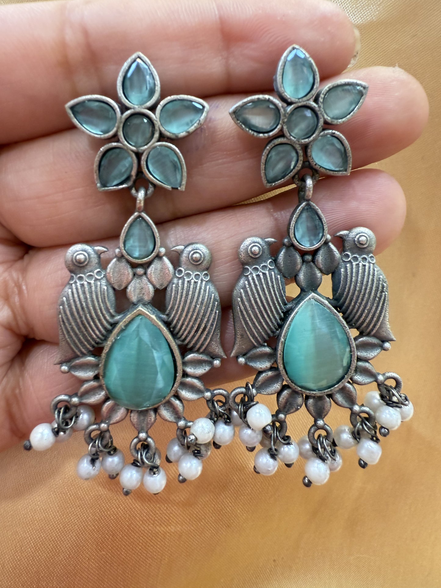 Appealing Oxidized Sky Blue Stone And Beaded Work Bird Designs Earrings For Women