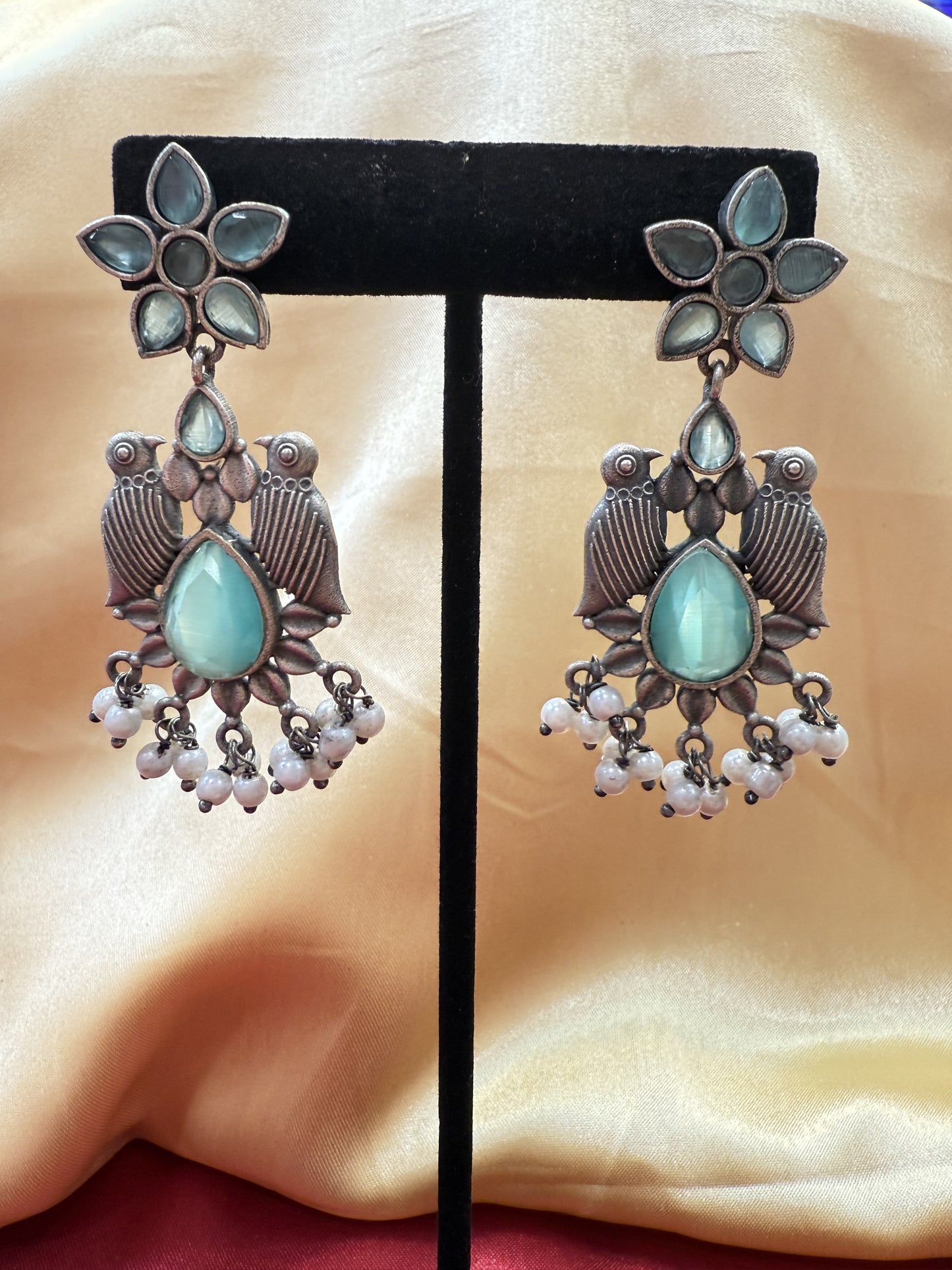 Appealing Oxidized Sky Blue Stone And Beaded Work Bird Designs Earrings For Women