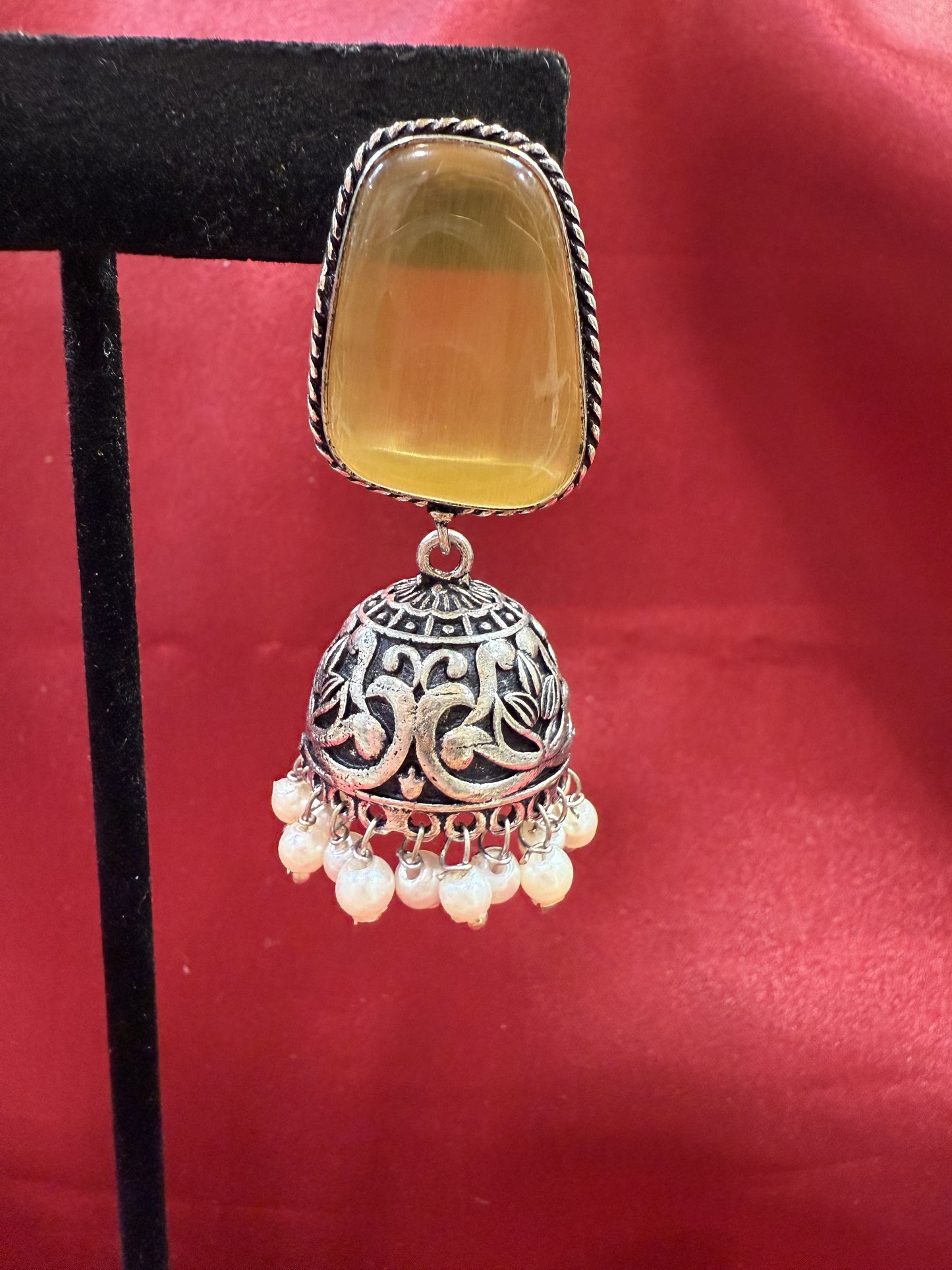 Beautiful Oxidized Yellow Stone Jhumka With White Color Bead Hangings