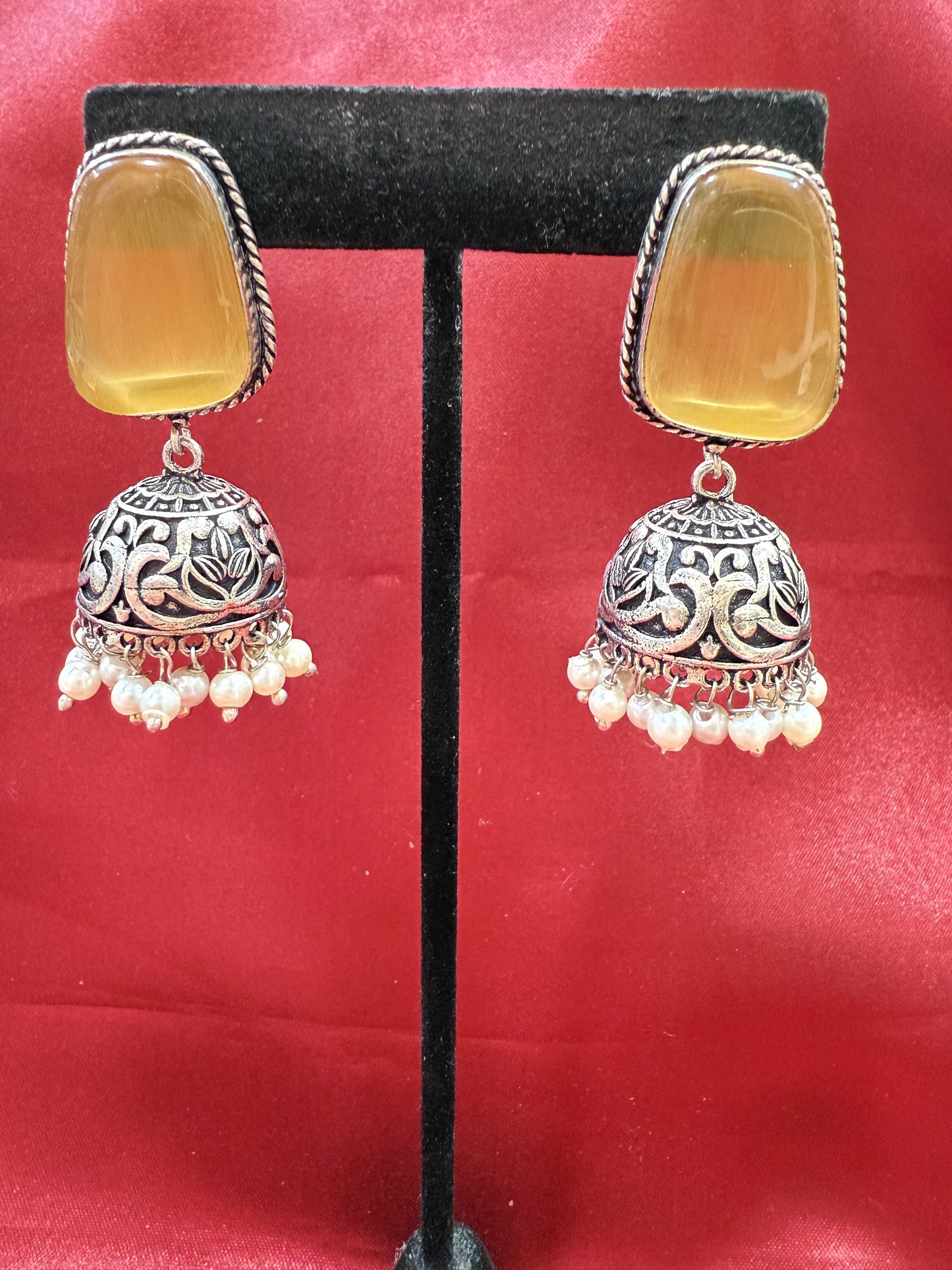 Beautiful Oxidized Yellow Stone Jhumka With White Color Bead Hangings