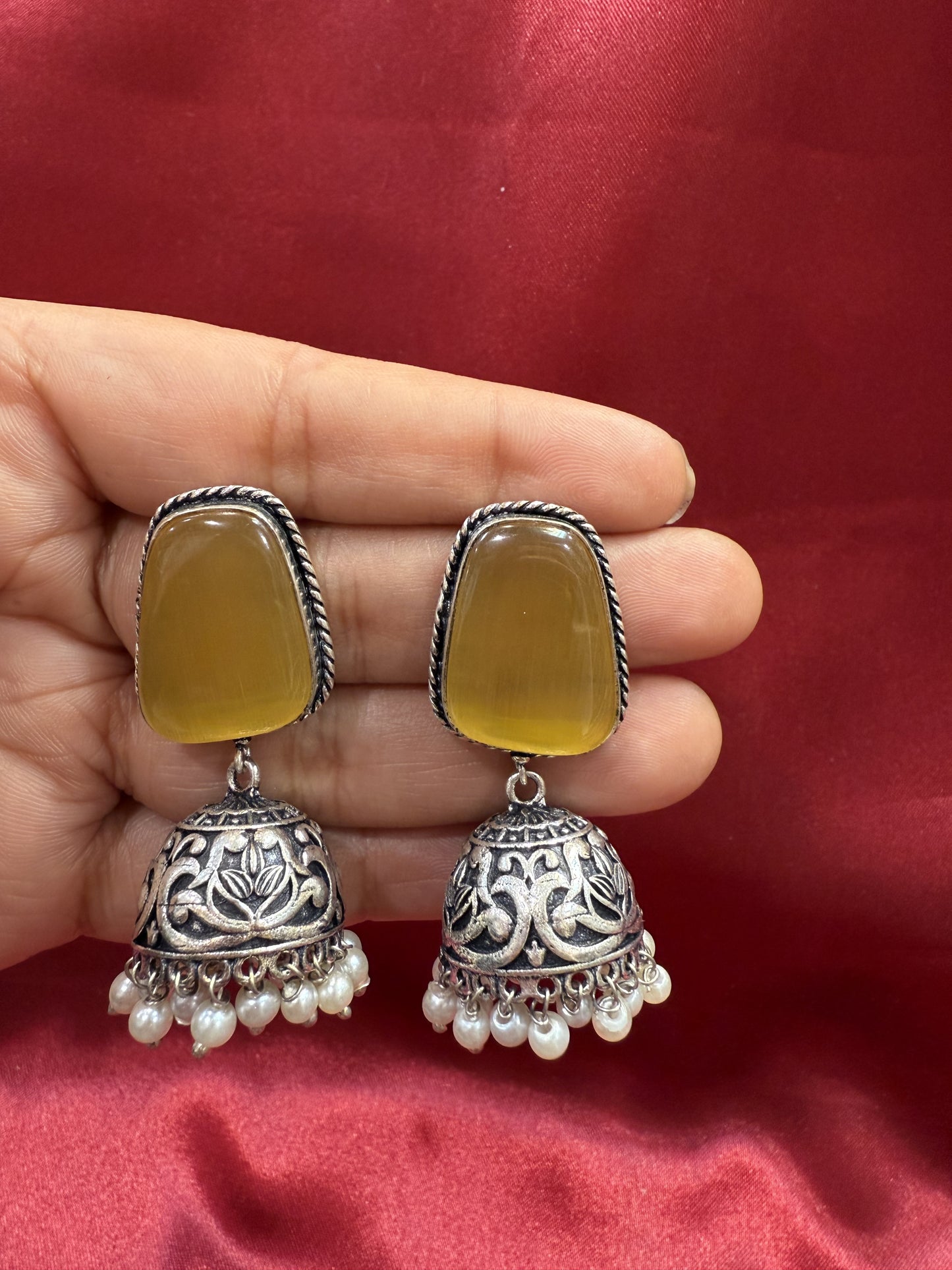 Beautiful Oxidized Yellow Stone Jhumka With White Color Bead Hangings