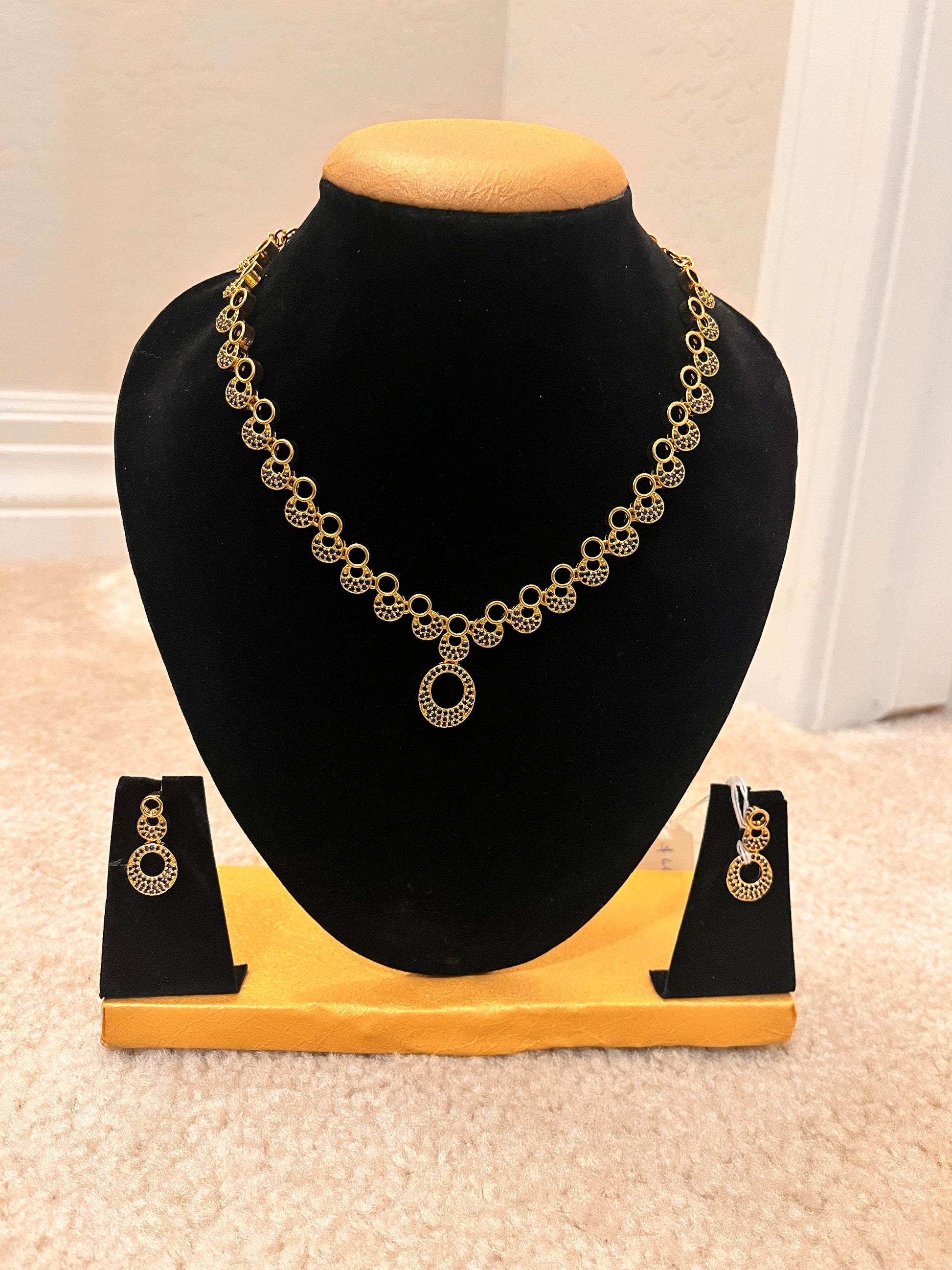 Gorgeous Gold Plated And Blue Stoned Necklace Set For Women