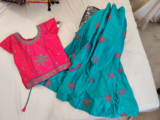Pleasing Green And Pink Lehenga And Top Set
