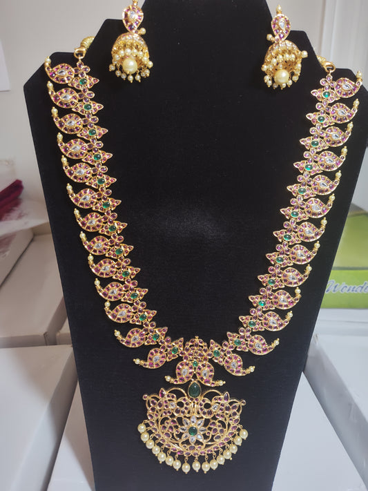 Alluring Long Gold Mango Motif Design Necklace Set With Multicolor Stones