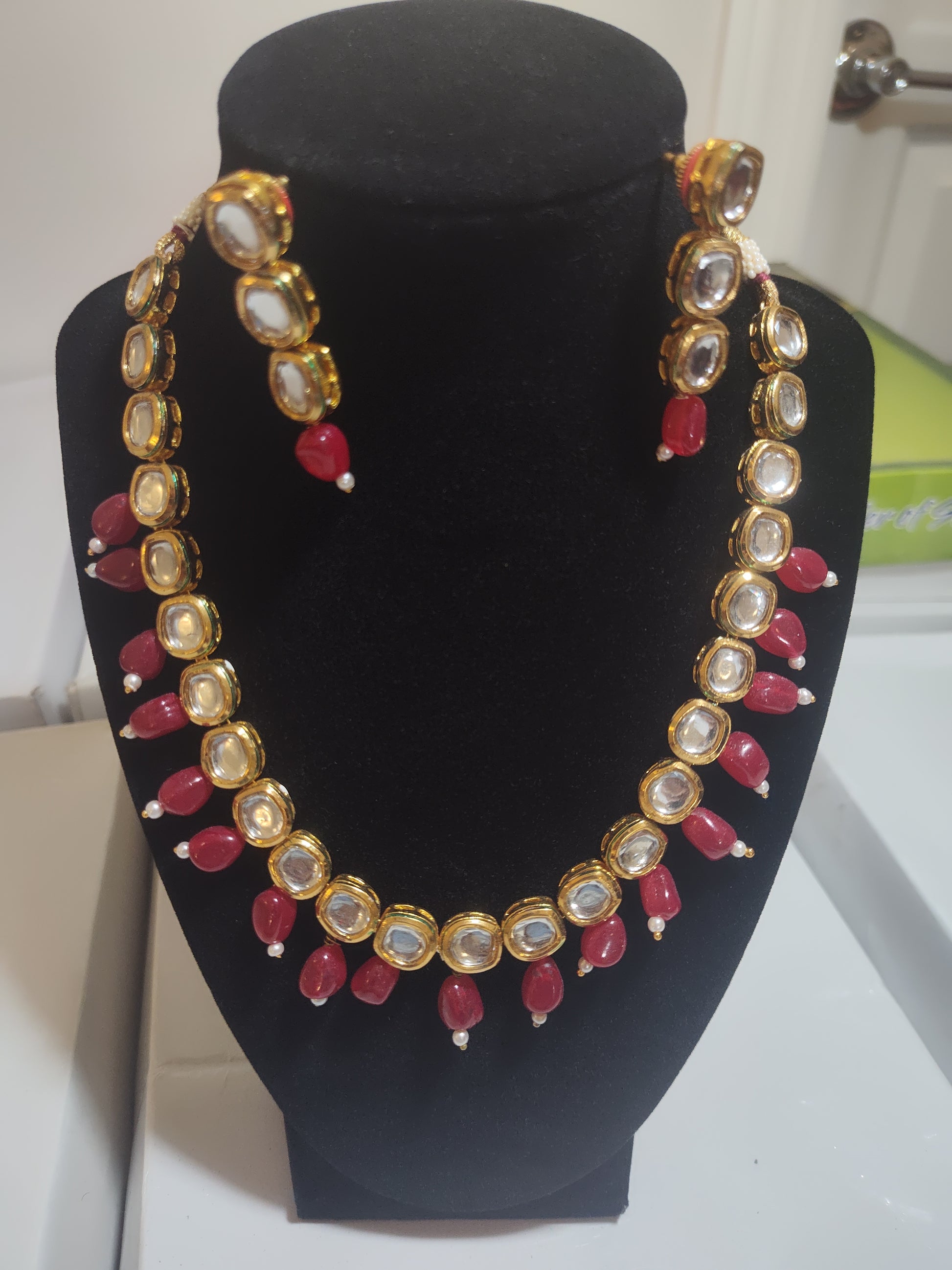 Elegant Kundan Necklace Set With Red Color Hangings In Tempe