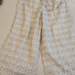 Alluring White Colored Palazzo Pants With Gold Print For Women
