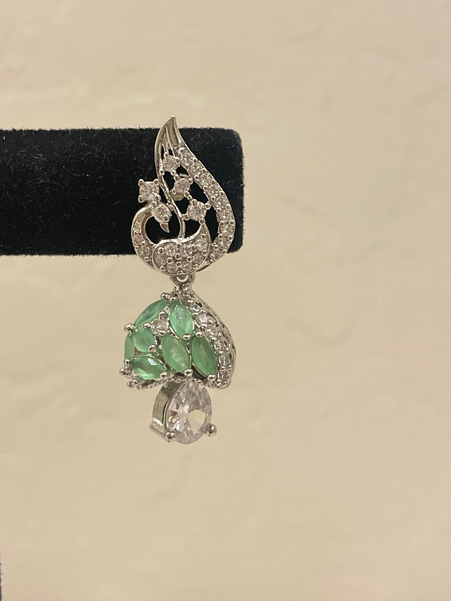 Stunning American Diamonds Earrings With Pastel Green Stones