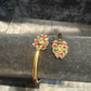 Beautiful Gold Plated With Green Hot Pink And White Stone Bracelet With Flower Design