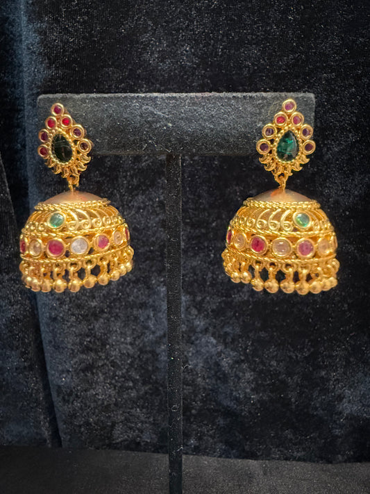 Dazzling Gold Plated Designer Jhumka with Green Color Stone And Golden Beads