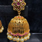 Dazzling Gold Plated Designer Jhumka with Hot Pink Color Stone With Pearl Drop