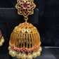 Dazzling Gold Plated Designer Jhumka with Hot Pink Color Stone With Pearl Drop