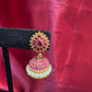 Appealing Gold Plated Designer Jhumka with Hot Pink Color Stone With Pearl Drop