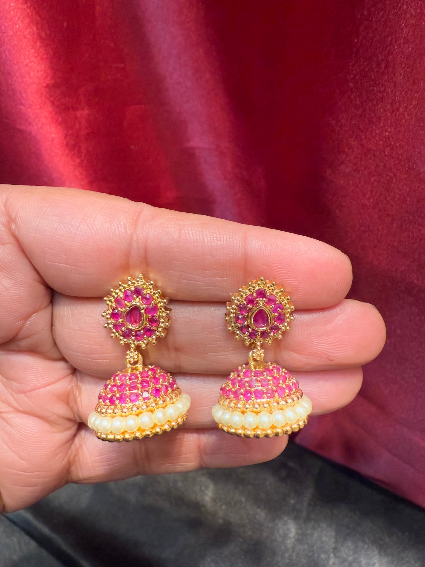 Appealing Gold Plated Designer Jhumka with Hot Pink Color Stone With Pearl Drop