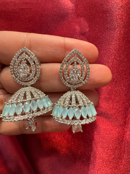 Dazzling American Diamond Design Jhumka With Light Blue Color Stone With White Stone Bead