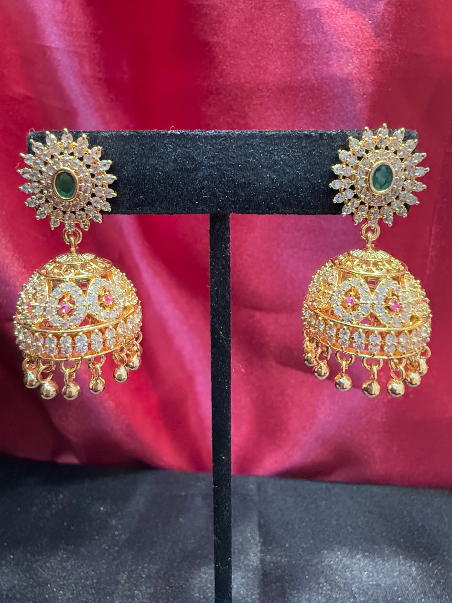 Appealing Gold Plated Designer Jhumka With Green Color Stone With Golden Beads