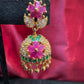 Dazzling Gold Plated Designer Jhumka with Hot Pink Color Stone And Golden Beads With Flower Designs