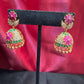 Dazzling Gold Plated Designer Jhumka with Hot Pink Color Stone And Golden Beads With Flower Designs