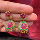 Dazzling Gold Plated Designer Jhumka with Hot Pink Color Stone And Golden Beads With Flower Designs