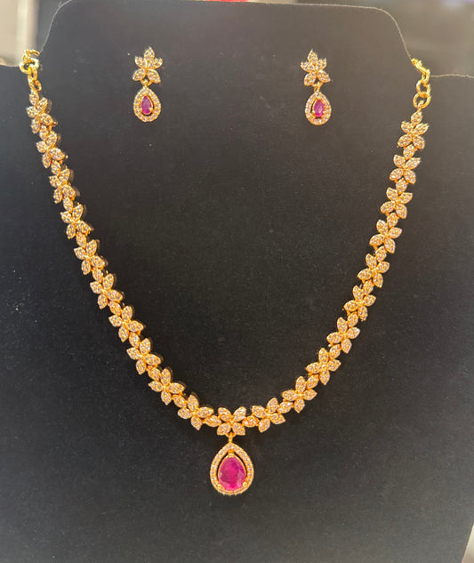 Alluring Dark Pink Color And White Stone Gold Plated Necklace With Earrings Set