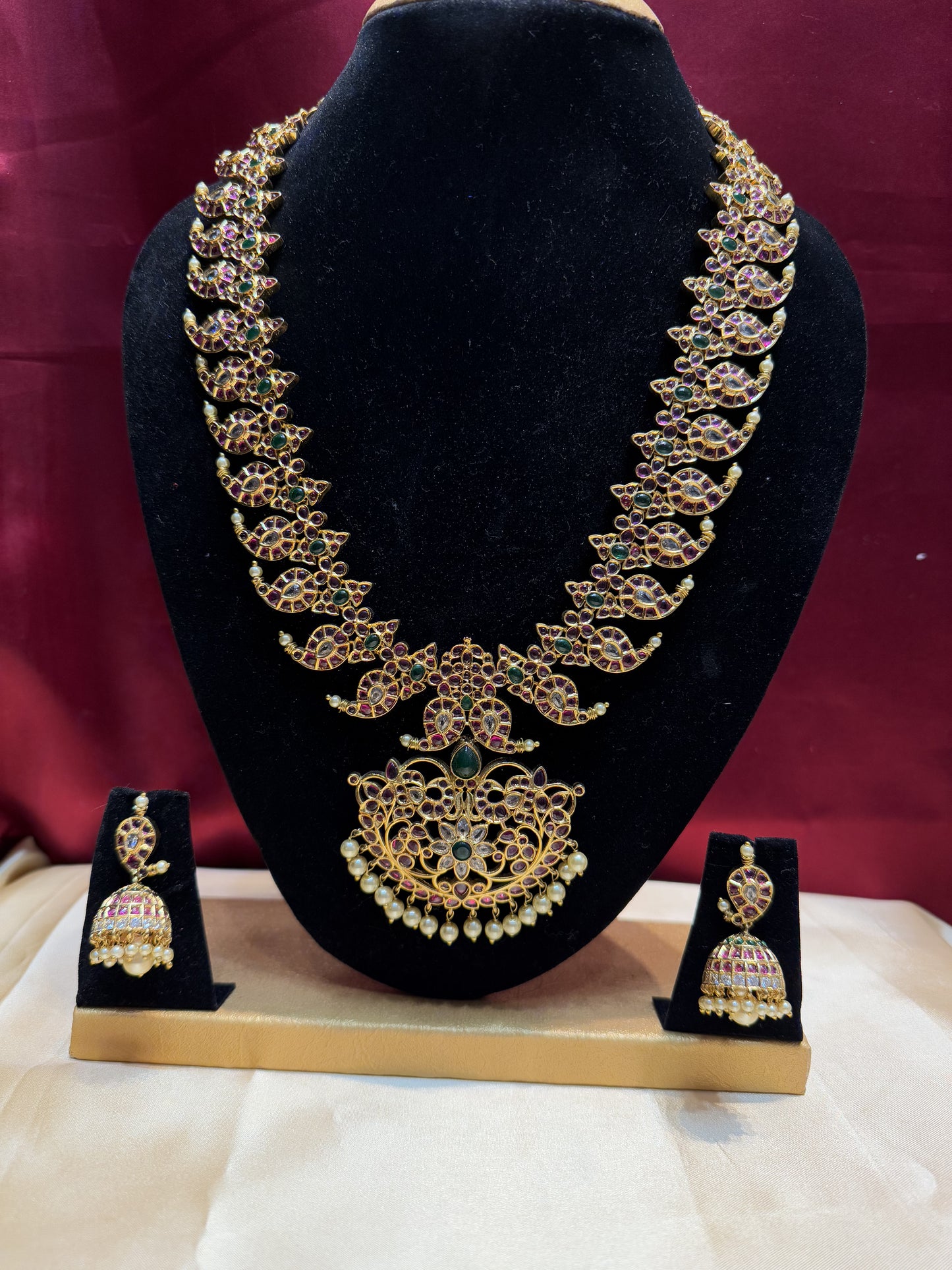 Alluring Long Gold Mango Motif Design Necklace Set With Multicolor Stones