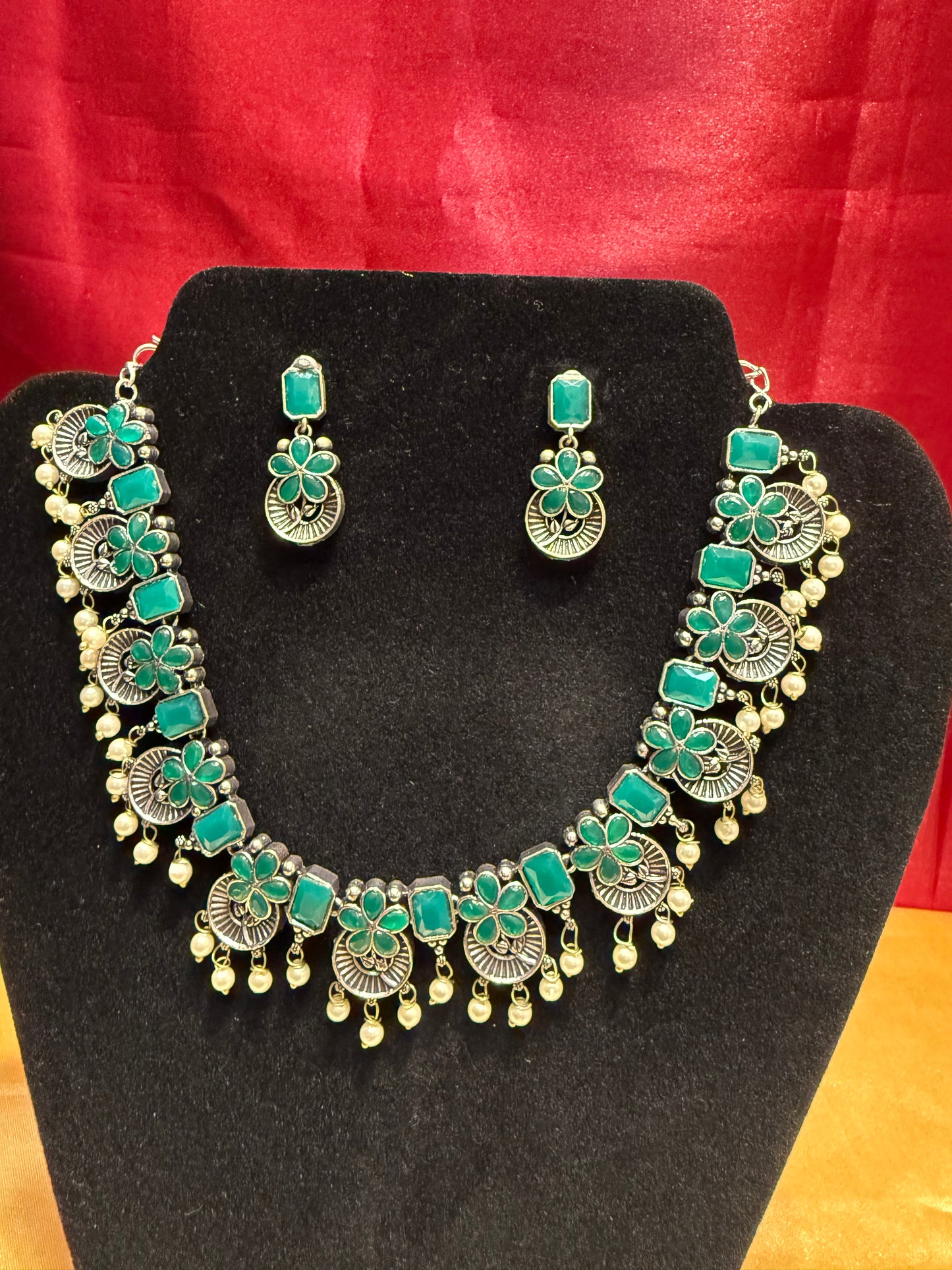 Alluring Green Color Oxidized Beautiful Pearl Drop Design Necklace With Earrings Set