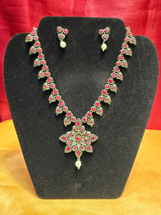 Alluring Pink Color Oxidized Flower Design Necklace With Earrings Set