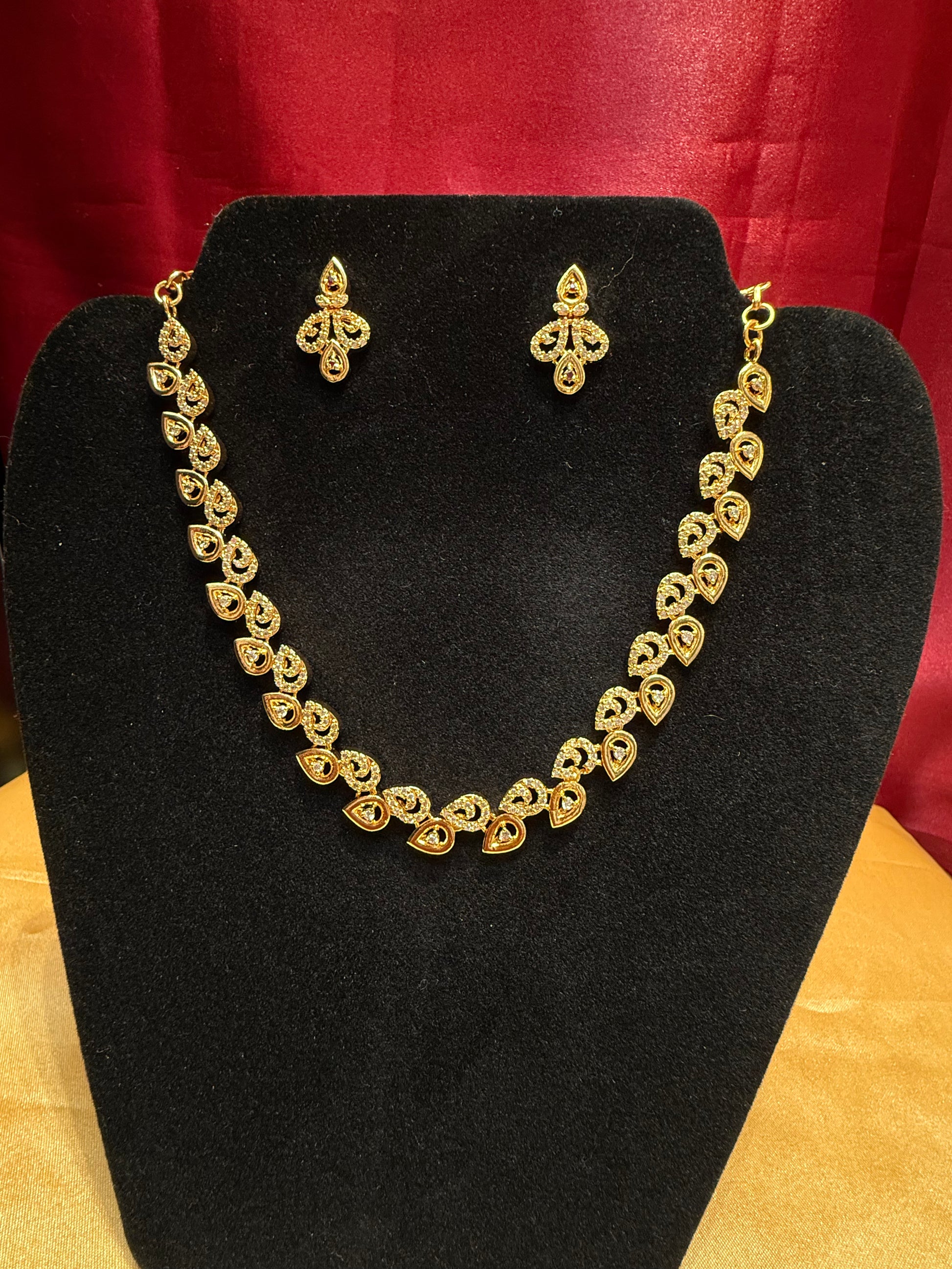 Stunning White Stone Studded Gold Plated Necklace With Earrings Set