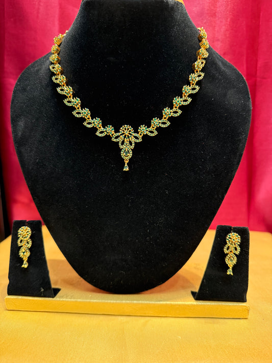 Beautiful Green Stone Studded Gold Plated Necklace With Earrings Set