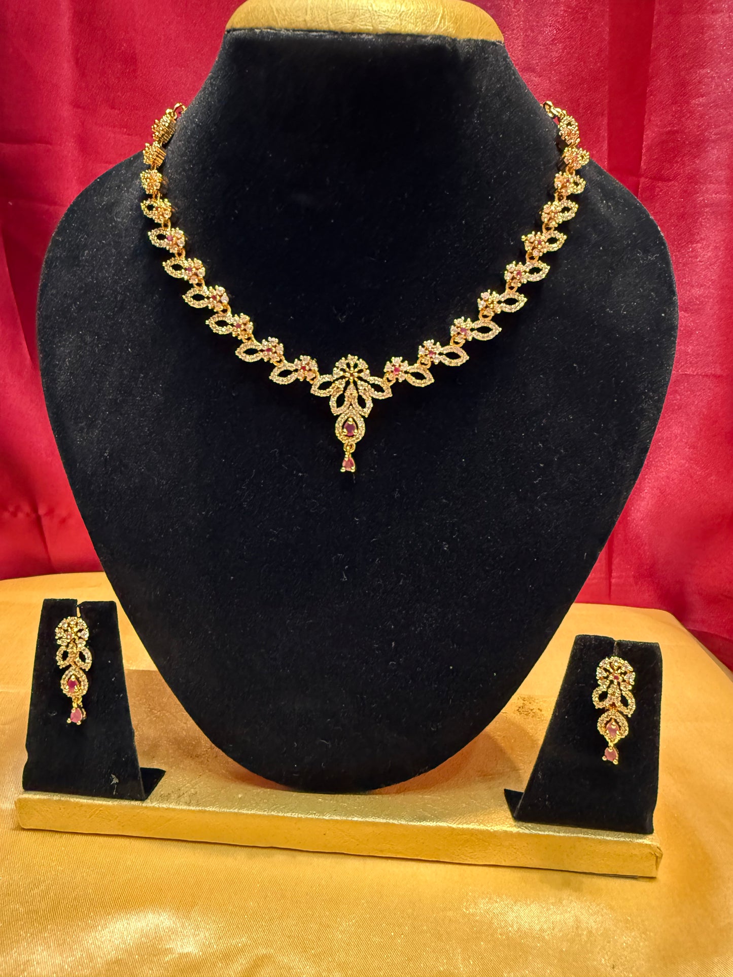 Appealing Gold Plated With Pink And White Stones Necklace And Earrings