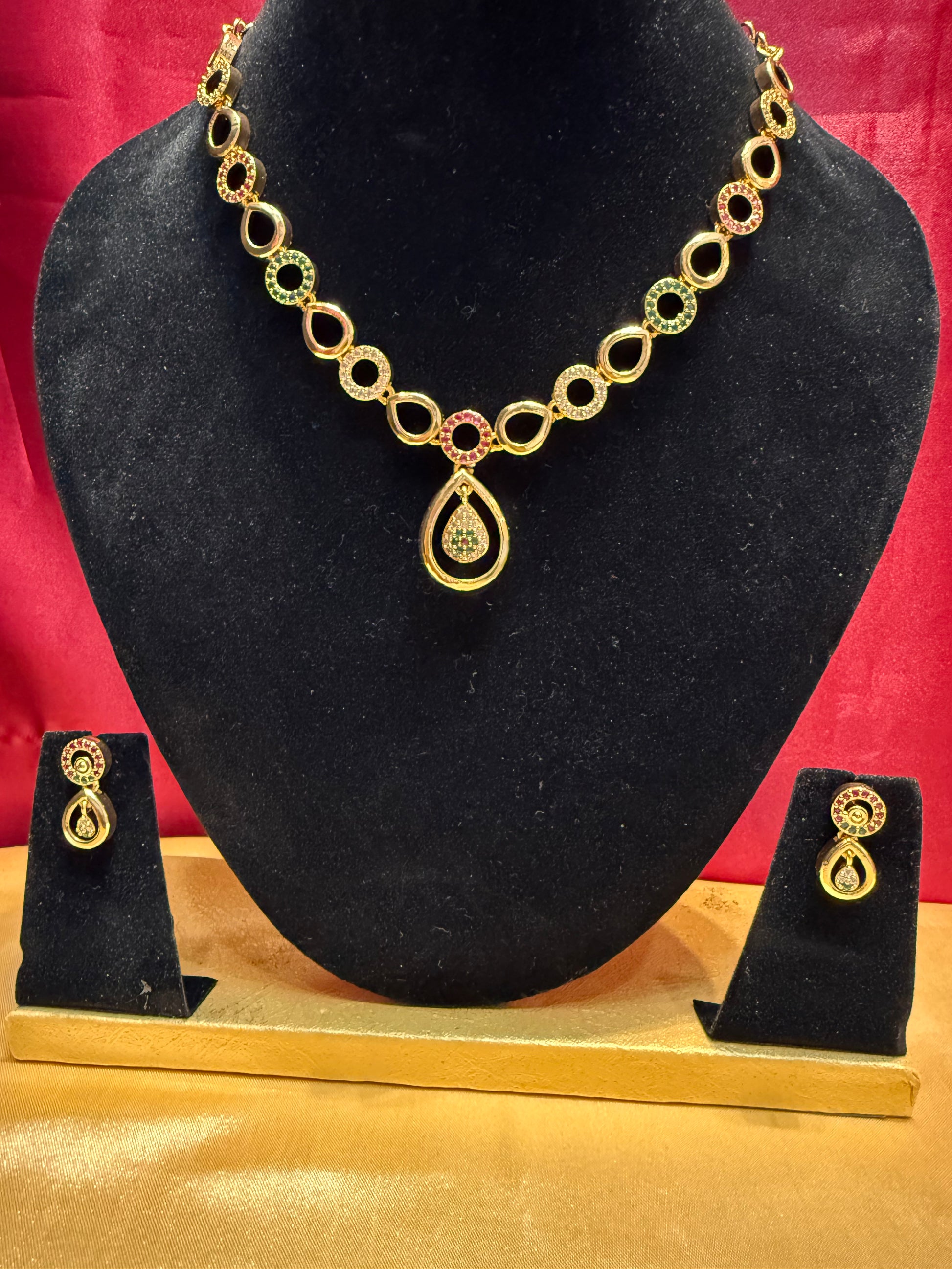 Appealing Multicolor Stones Studded Gold Plated Necklace With Earrings Set