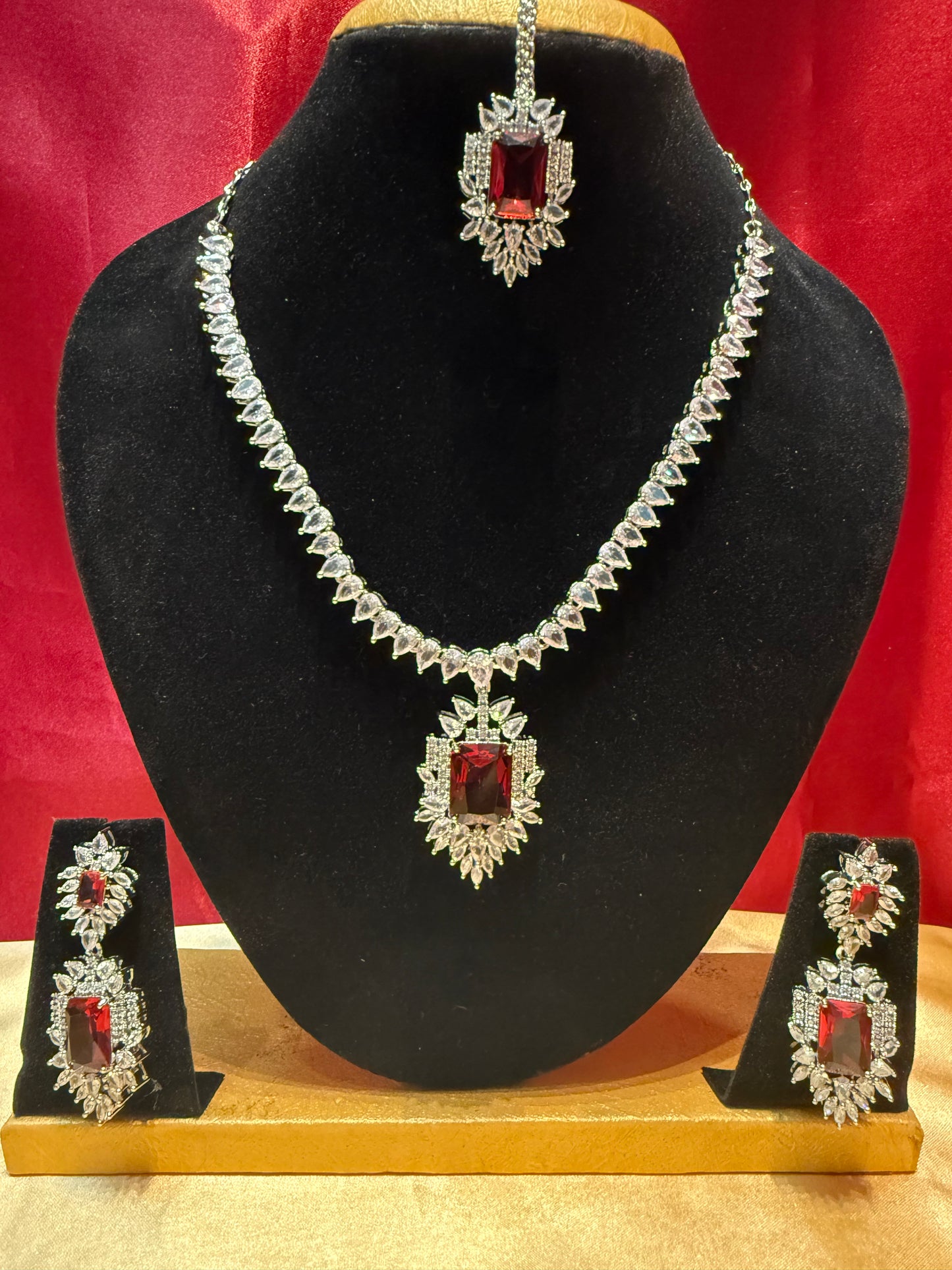 Alluring Red And White Stone American Diamond Necklace Maang Tikka And Earrings Set