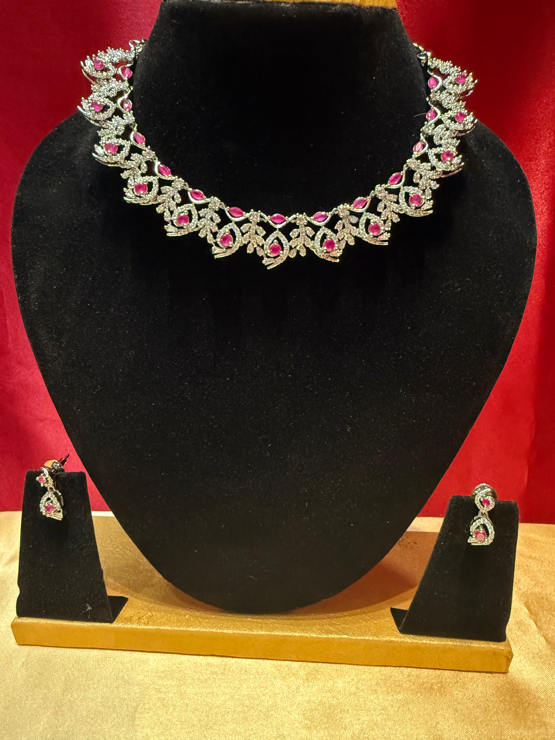 Alluring Pink And White Stone American Diamond Necklace With Earrings Set