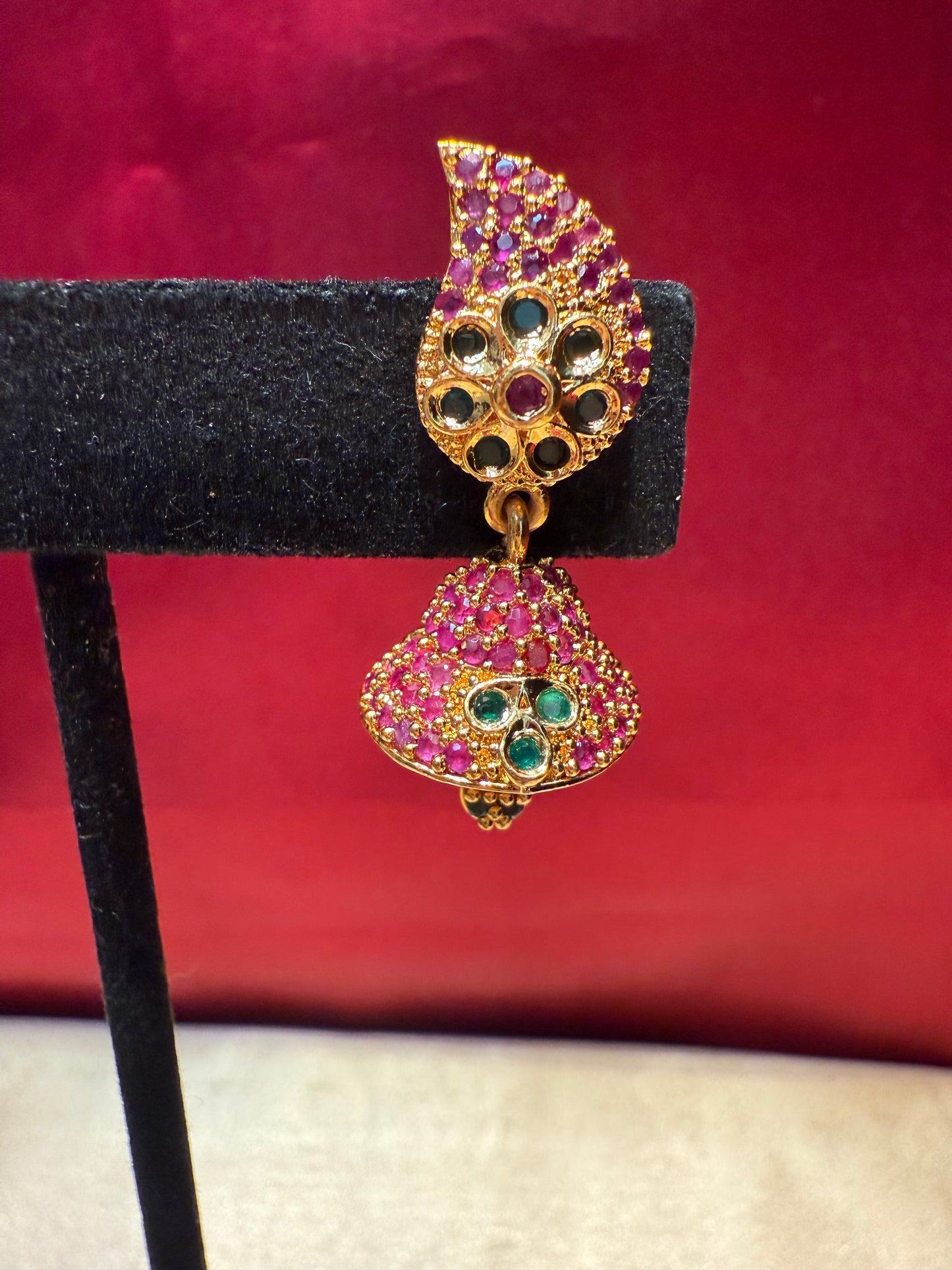 Graceful Green And Pink Stoned Gold Plated With Beautiful Leaf Design Jhumka Earrings Near Me