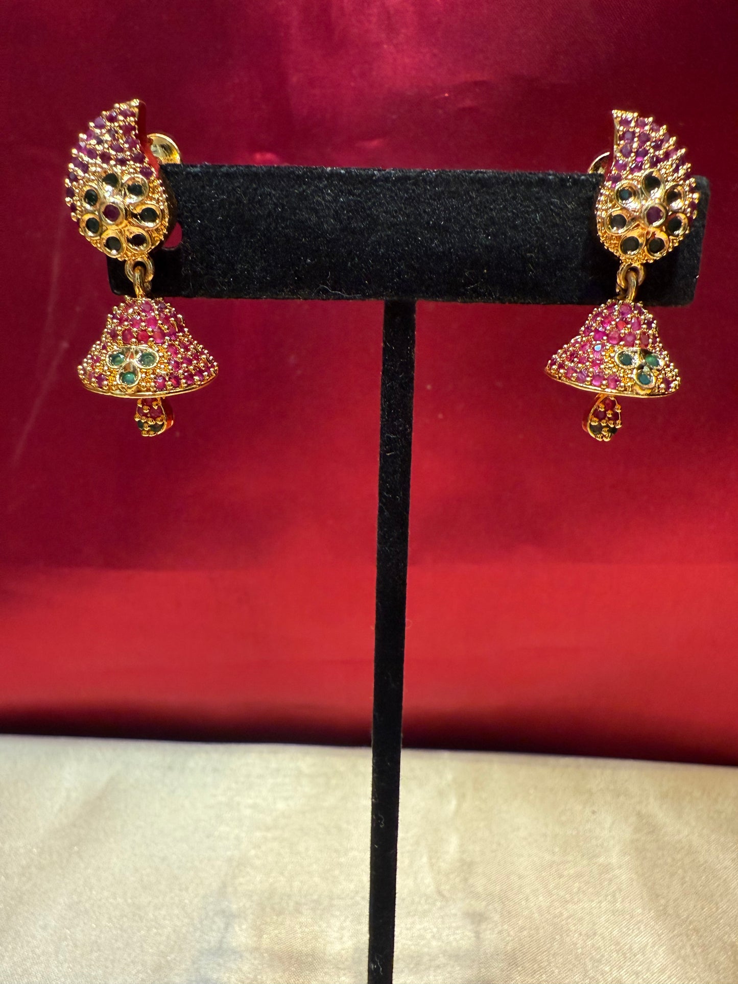 Graceful Green And Pink Stoned Gold Plated With Beautiful Leaf Design Jhumka In Arizona