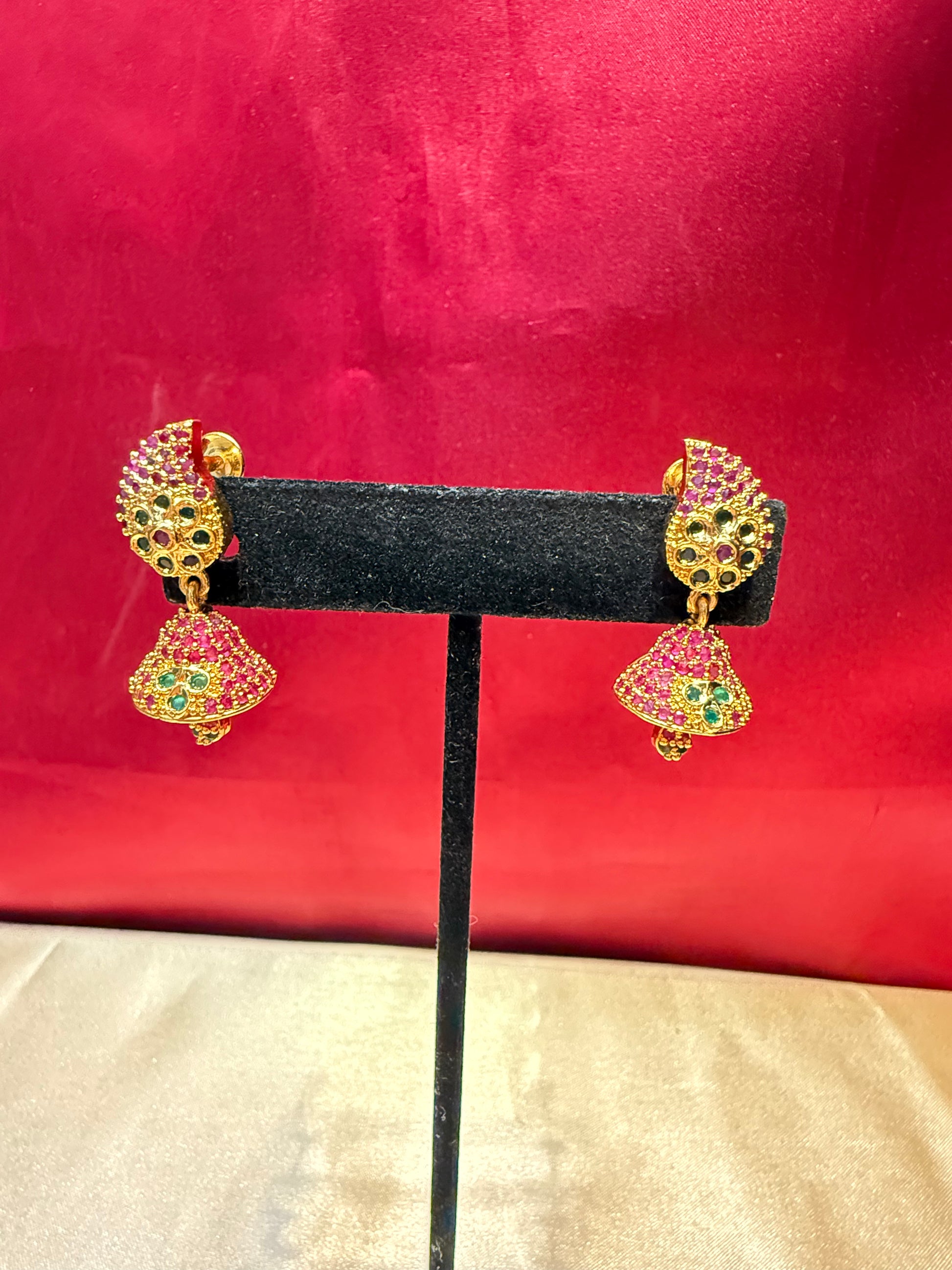 Graceful Green And Pink Stoned Gold Plated With Beautiful Leaf Design Jhumka Earrings