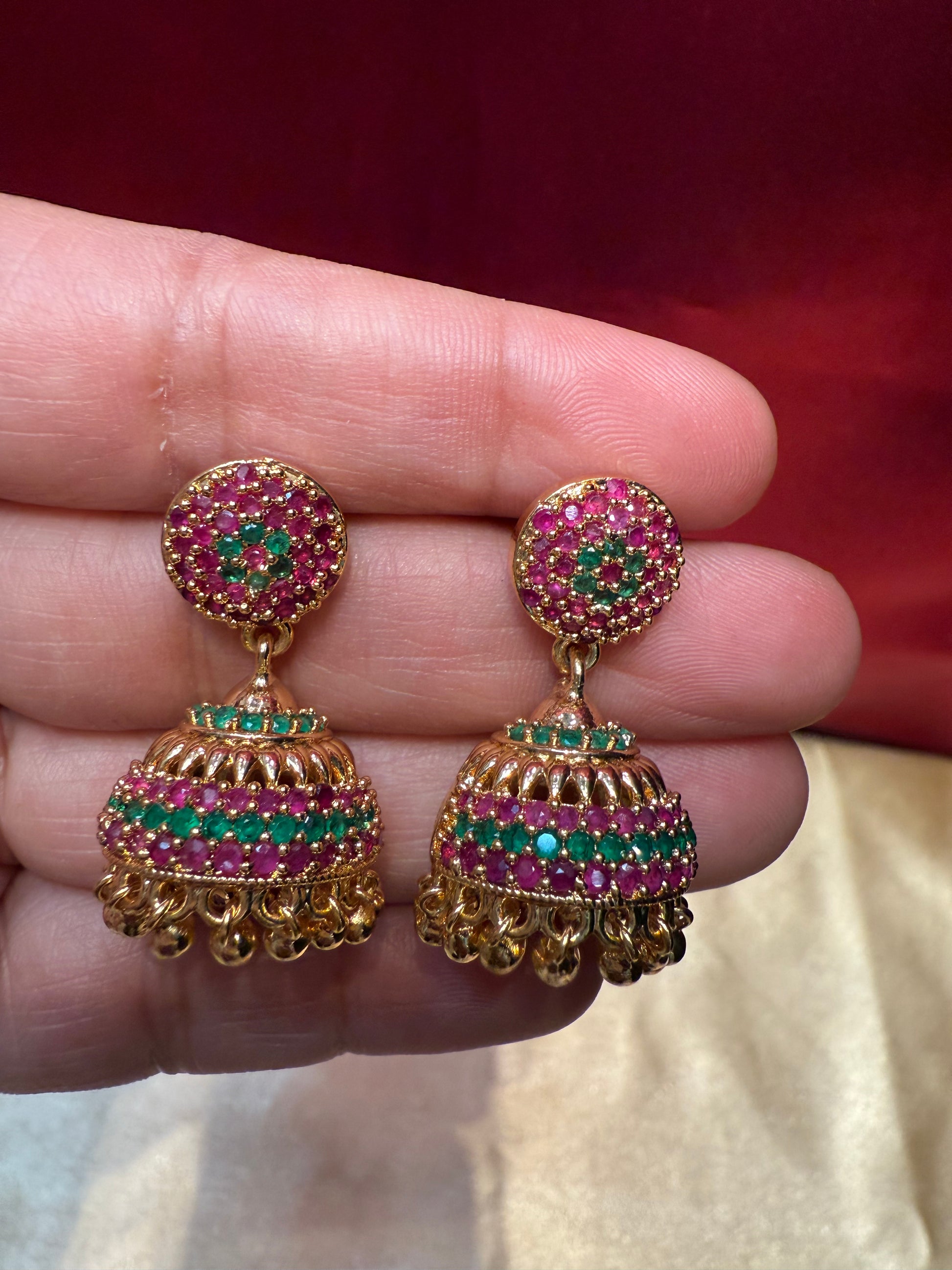 Dazzling Gold Plated Design Jhumka With Hot Pink Stone In Tempe