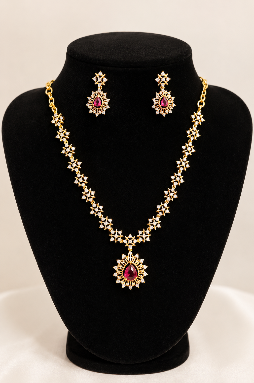 Alluring  Gold Plated American Diamond Ruby  Dark Pink Stone Necklace Set with Earrings