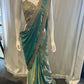 Attractive Teal Blue Color Tissue Silk Lehenga Choli With Embroidery And Sequins Work For Women