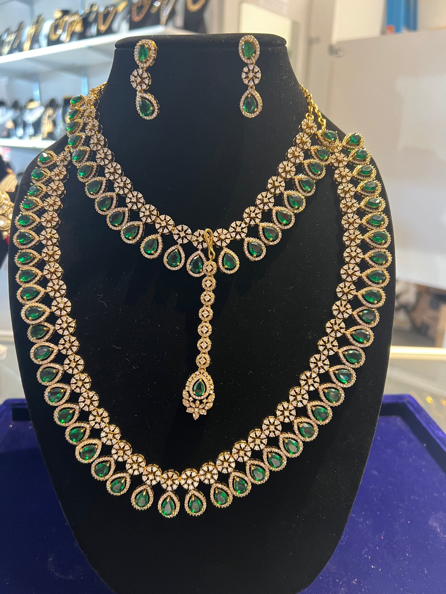 Grand Gold and Emerald Green Haram Set with Matching With Maang Tikka For Women