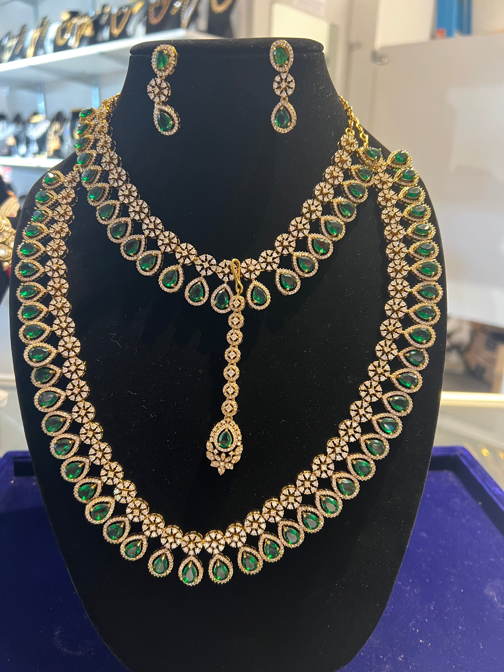 Grand Gold and Emerald Green Haram Set with Matching With Maang Tikka For Women
